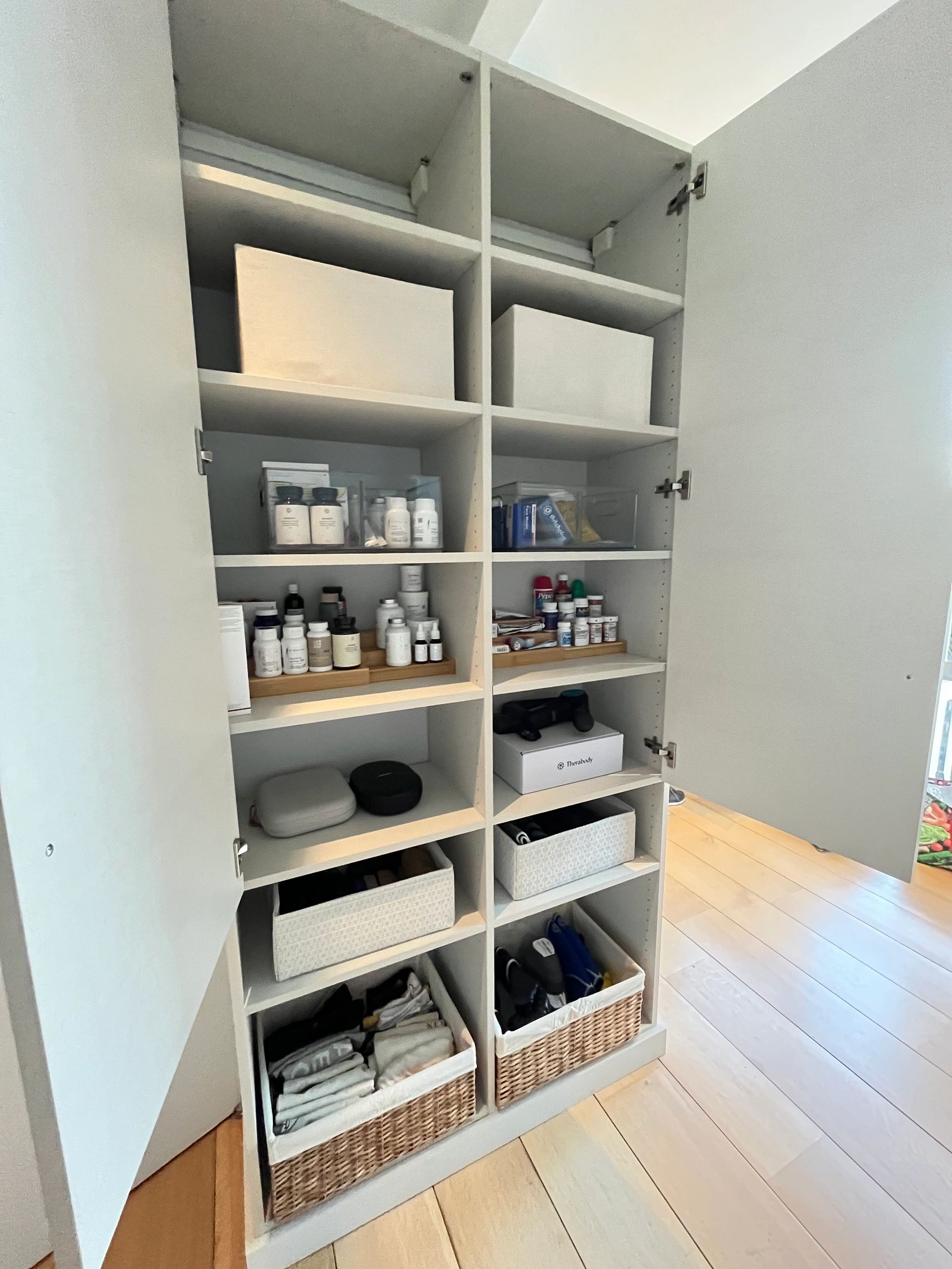 Built-in shelving unit with personal care products